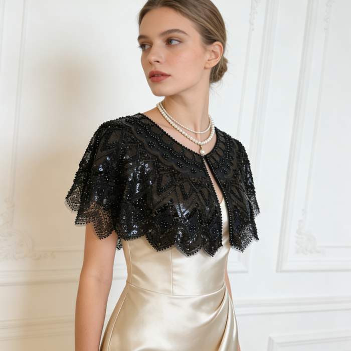 Luxury black gothic wedding shoulder cape with handcrafted bead embroidery and shimmering sequins for formal bridal styling.