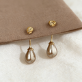 Handmade gray-purple freshwater pearl drop earrings featuring textured 14K gold-plated studs for bridal and formal occasions.