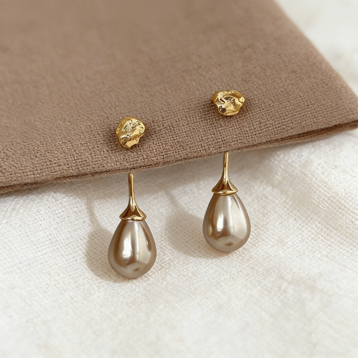 Handmade gray-purple freshwater pearl drop earrings featuring textured 14K gold-plated studs for bridal and formal occasions.