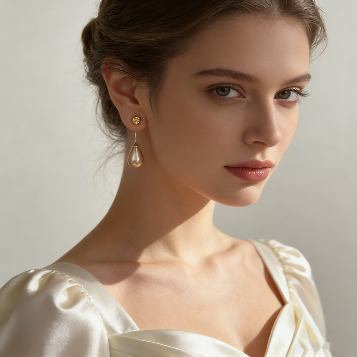 Handmade gray-purple freshwater pearl drop earrings featuring textured 14K gold-plated studs for bridal and formal occasions.