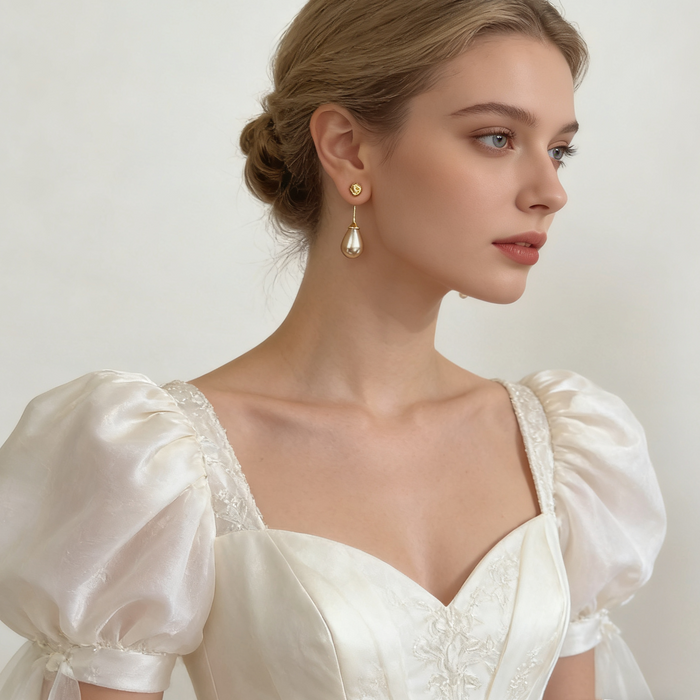 Handmade gray-purple freshwater pearl drop earrings featuring textured 14K gold-plated studs for bridal and formal occasions.