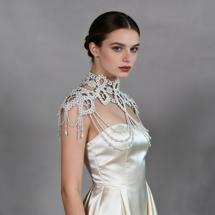 Luxury Rococo bridal necklace cape with handcrafted pearl lattice, cascading shoulder chains, and statement wedding shoulder jewelry.