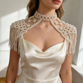 Handmade Victorian pearl fringe bridal cape with cascading faux pearl tassels for elegant wedding dress styling.