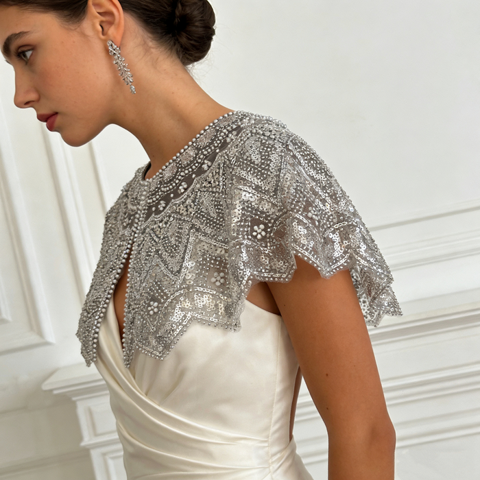 Luxury silver sequin wedding shoulder cape handcrafted with couture bead embroidery for bridal gowns.