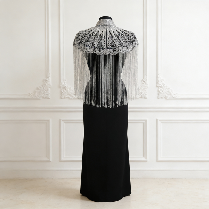 Elegant Art Deco inspired shoulder cape with silver embroidery and cascading fringe for bridal and evening wear.