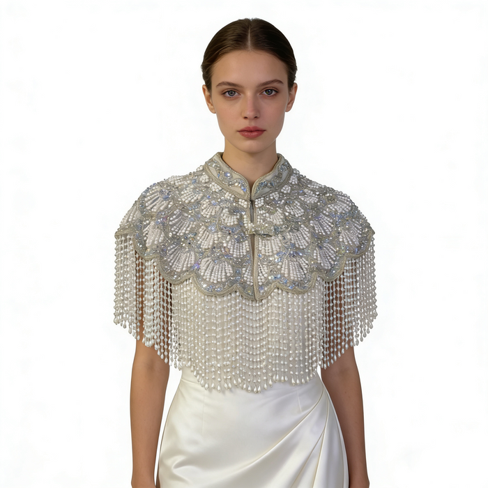 Elegant silver white bridal shoulder cape with handcrafted pearl embroidery and flowing pearl fringe for weddings.