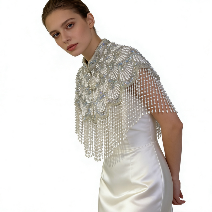 Elegant silver white bridal shoulder cape with handcrafted pearl embroidery and flowing pearl fringe for weddings.