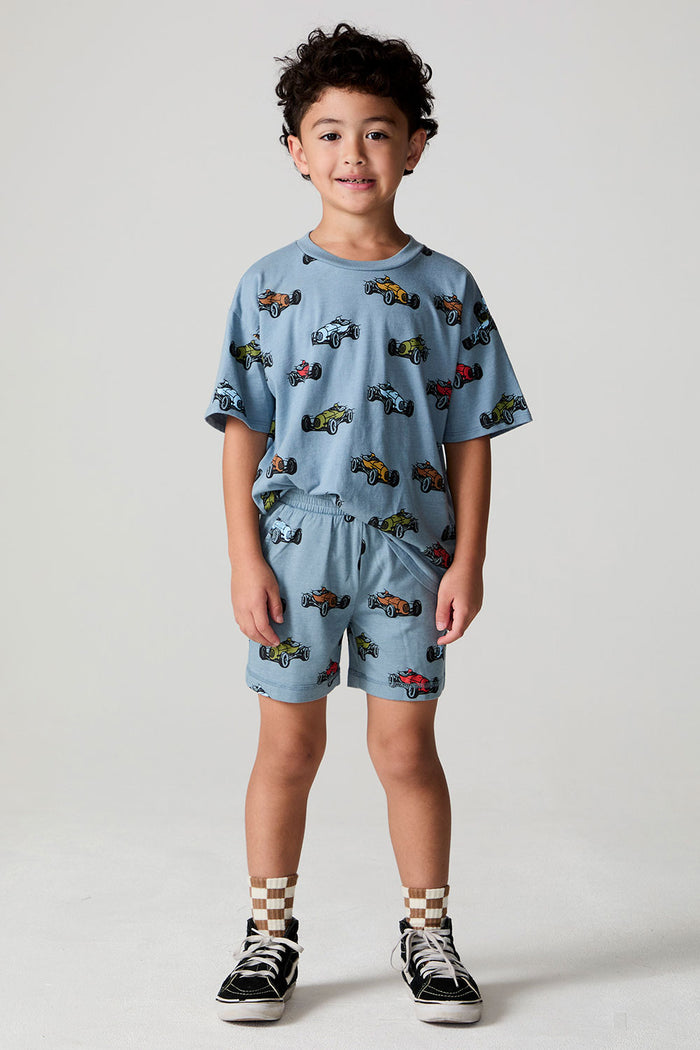 Full body front view of a boy wearing the Chaser Have a Nice Day Shorts on a neutral background