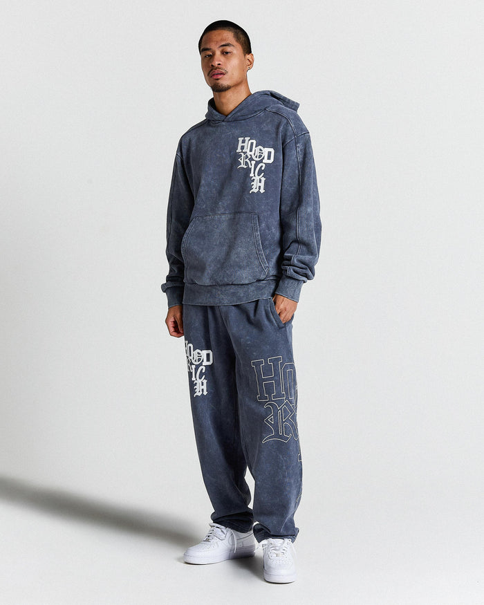 Person wearing a blue hoodie and sweatpants set with text on a white background