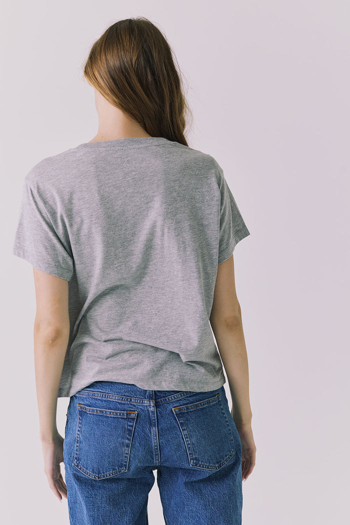 Back view of the Chaser Home Run Tee in Heather Grey with a clean solid finish and casual everyday silhouette