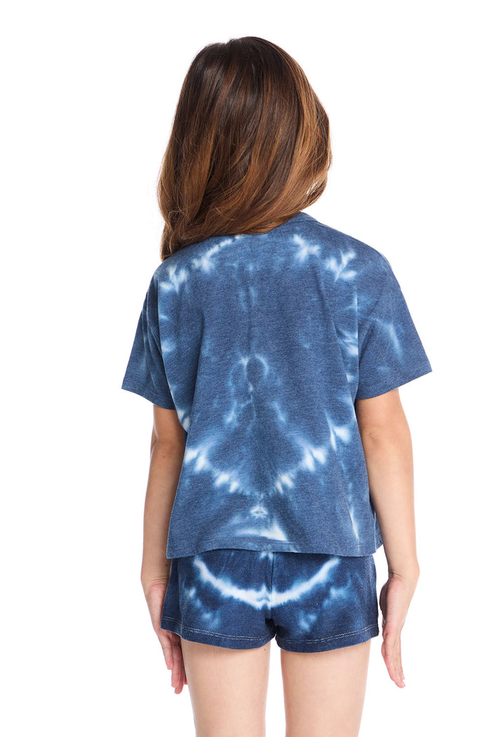Back view of the Chaser Kids Indigo Heart Tie-Dye T-Shirt showcasing the symmetrical indigo tie-dye pattern and boxy silhouette