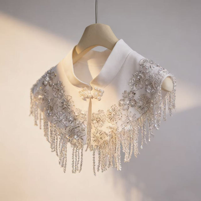 Ivory beaded bridal capelet with sequin embroidery and fringe details, luxury short wedding shawl for bridal gown.