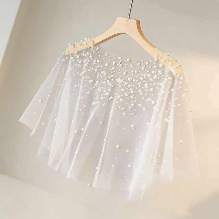 Ivory pearl bridal capelet with hand-sewn pearls and sheer chiffon tulle, elegant wedding dress shoulder cover.