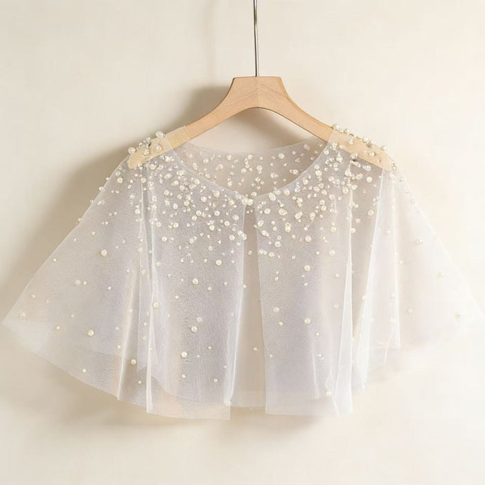 Ivory pearl bridal capelet with hand-sewn pearls and sheer chiffon tulle, elegant wedding dress shoulder cover.