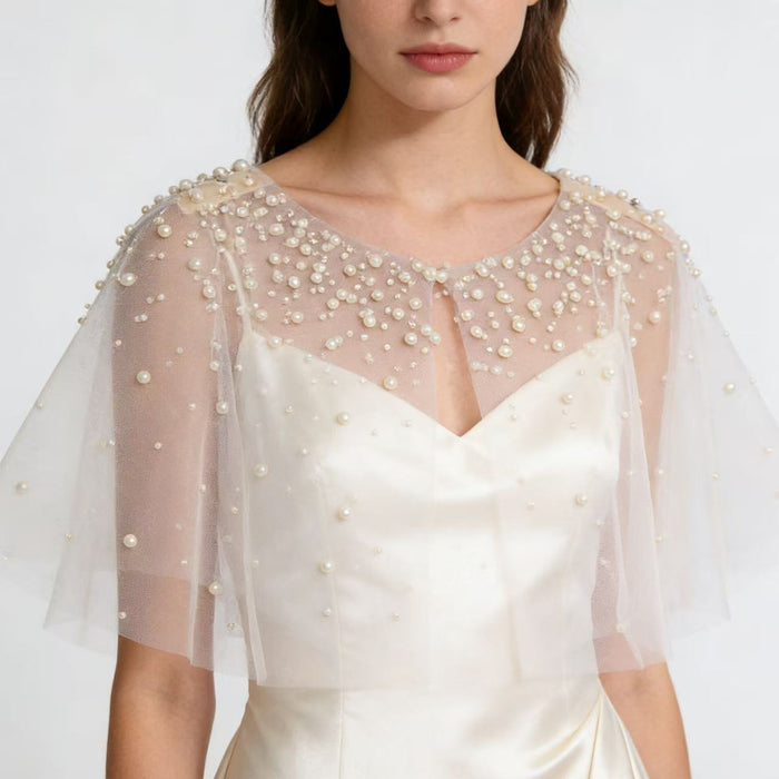 Ivory pearl bridal capelet with hand-sewn pearls and sheer chiffon tulle, elegant wedding dress shoulder cover.