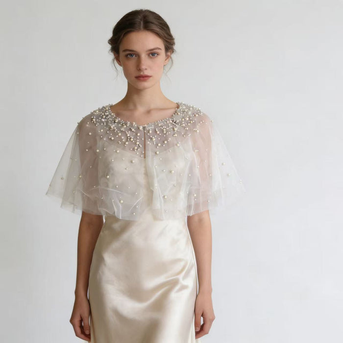 Handmade pearl embellished wedding capelet for brides, ivory chiffon bridal shawl and formal dress accessory.