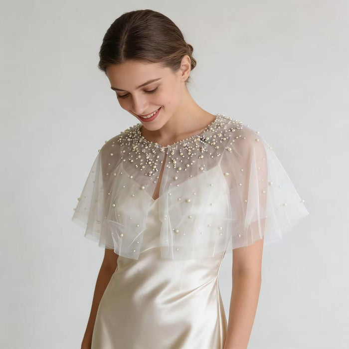 Handmade pearl embellished wedding capelet for brides, ivory chiffon bridal shawl and formal dress accessory.