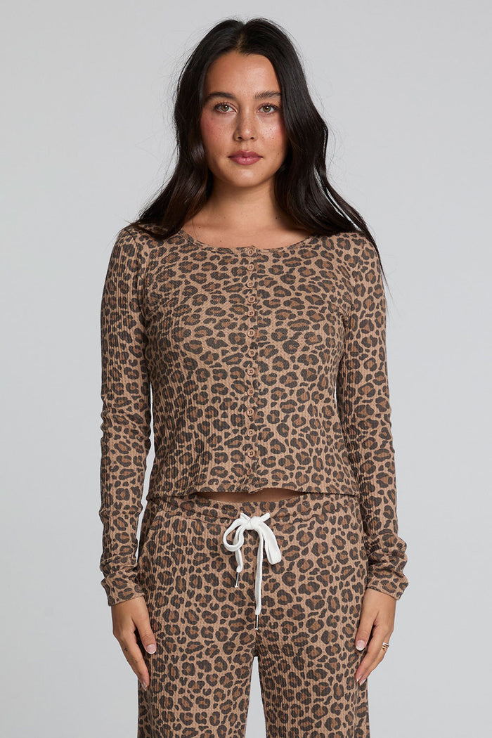 Front view of a woman wearing the Chaser  Klara Leopard Button Down Top on a neutral background