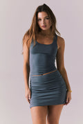 Angled front view of Chaser Brand Lander Future Gray Tank showing smooth stretch fit and minimal seam detail