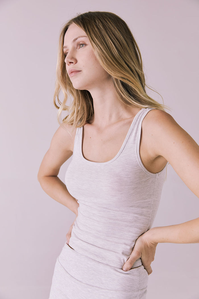 Angled view of Chaser Brand Lander Light Heather Gray Tank highlighting smooth ribbed texture and curved hem