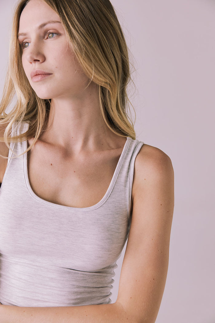 Detail view of Chaser Brand Lander Light Heather Gray Tank showing neckline and shoulder seam construction