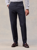 Deepwater navy linen trousers with side-adjuster tabs, cropped waist-to-shoe view.