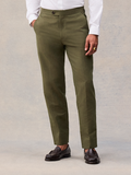Vintage olive suit pant on model, cropped waist to hem, tab waistband and tapered leg