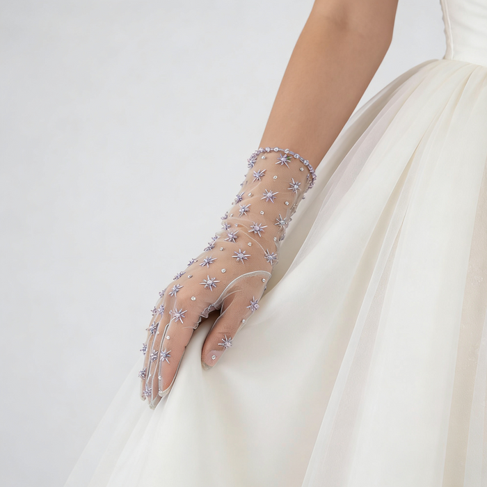Lavender crystal bridal gloves with hand embroidered tulle and sparkling rhinestone details in a sheer design.