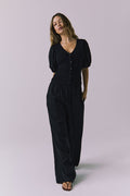 Chaser Abbie Black Blouse shown with matching Lee Trousers in a relaxed full body view as the model walks forward