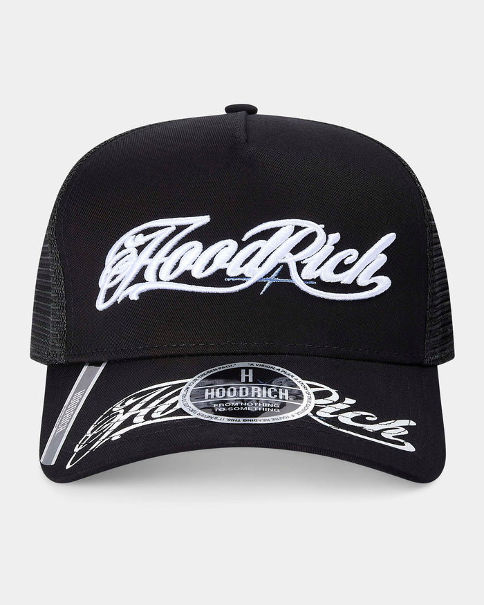 Black trucker cap with white "Hoodrich" embroidered on a light gray background