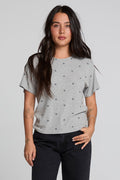Front view of a woman wearing the Chaser Leonor Light Heather Grey Tee on a neutral background