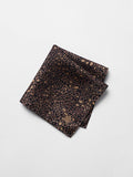 Brown and black leopard print pocket square, folded, with logo tag in corner