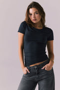 Front view of Chaser Brand Louiss Licorice Black Tee featuring crew neckline and ruched sides for a fitted silhouette