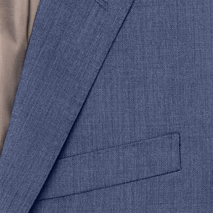 Close-up of light blue suit jacket lapel, buttonhole, and welt pocket