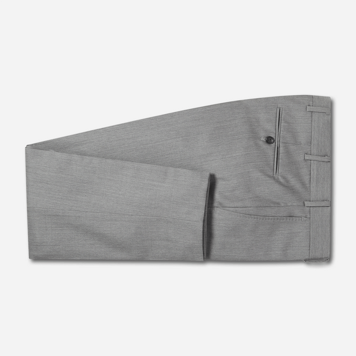 Light grey suit trousers folded flat, side pocket and belt loops visible