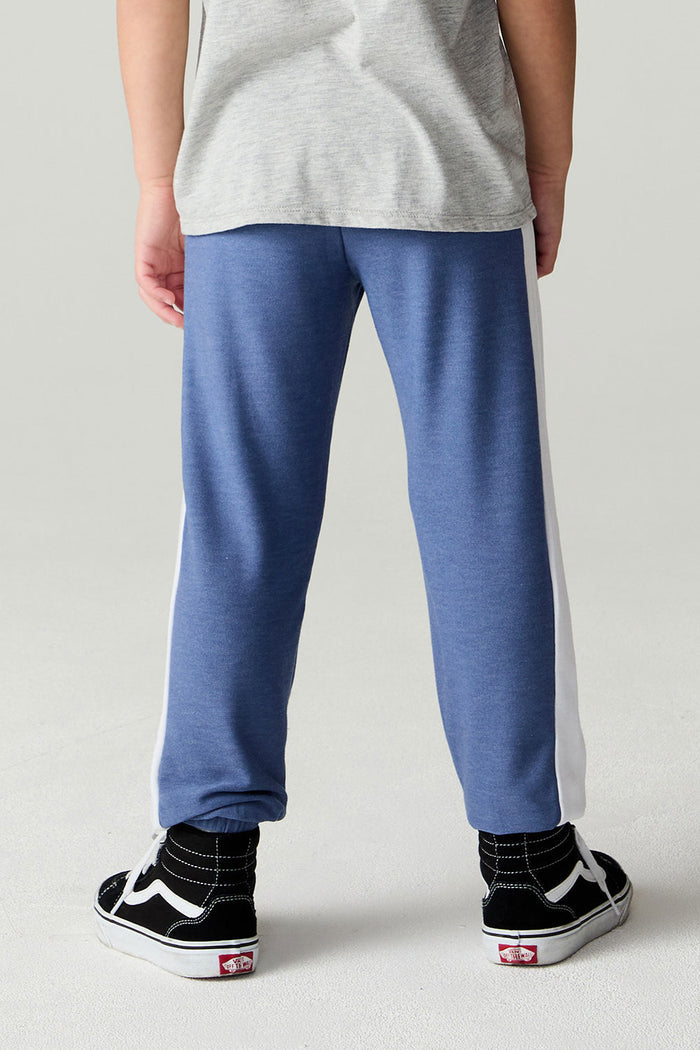 Back view of a boy wearing the Chaser Lounge Pants Boys Shamu Jogger on a neutral background