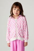 Front view of a girl wearing the Chaser Love Is Everywhere Girls Hoodie and pink pants