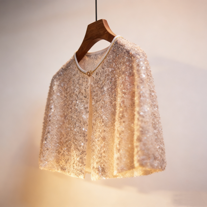 Luxury ivory bridal capelet covered with hand-applied sequins, crystal beads and faux pearls for an elegant wedding look.