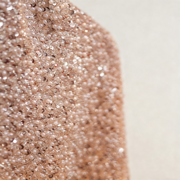 Luxury ivory bridal capelet covered with hand-applied sequins, crystal beads and faux pearls for an elegant wedding look.