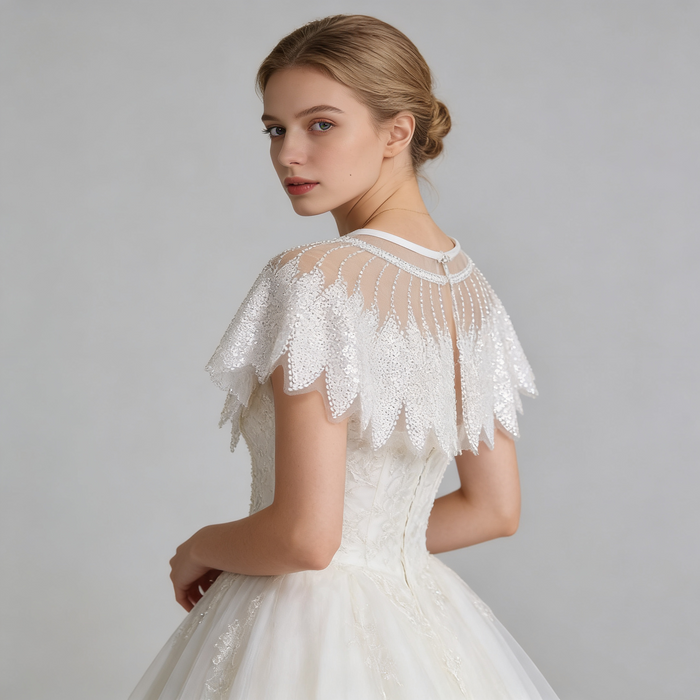 Handmade sparkling wedding shoulder cape featuring delicate tulle and shimmering sequin embroidery for elegant bridal styling.