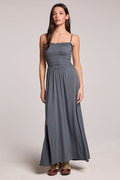 Front view of a woman wearing the Chaser Future Grey Marquise Dress and sneakers on a neutral background