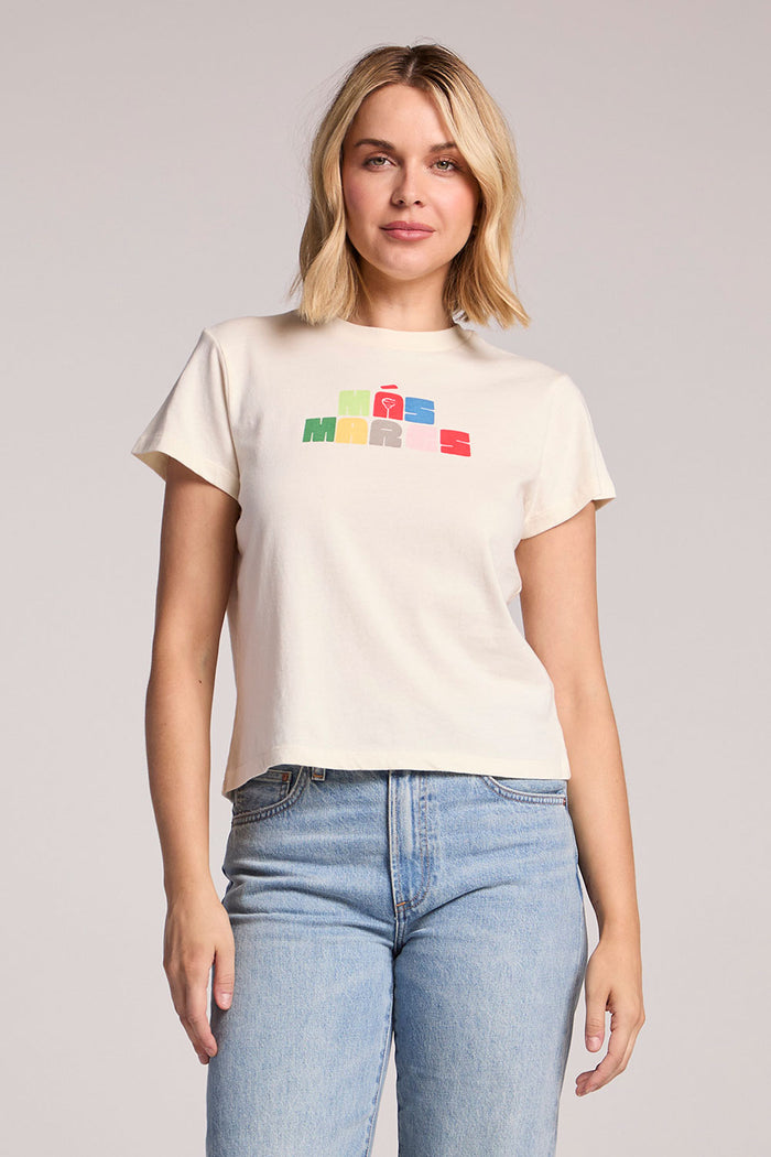 Front view of a woman wearing the Chaser Mas Margaritas Tee and jeans on a neutral background