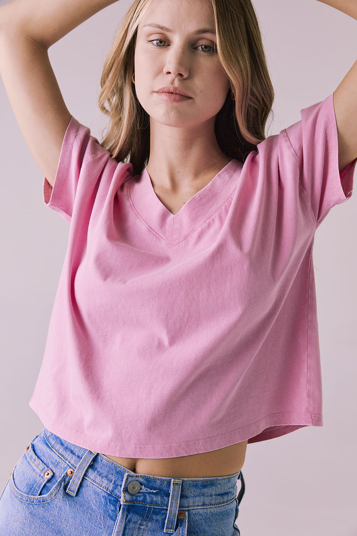 Front angle of the Chaser Brand Mazzy Bubblegum Tee showing relaxed fit and V-neckline