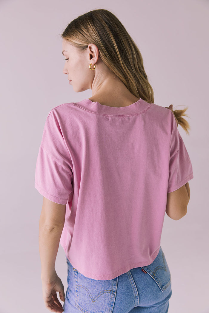 Back view of the Chaser Brand Mazzy Bubblegum Tee showing clean hemline and dropped-shoulder sleeve
