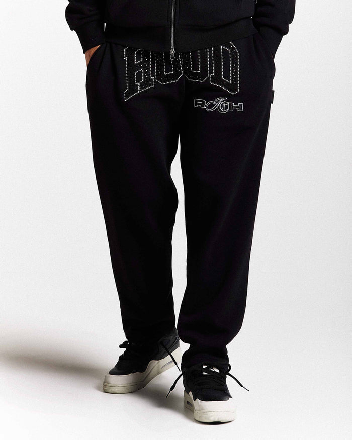 Black sweatpants with 'HOODRICH' text on a white background