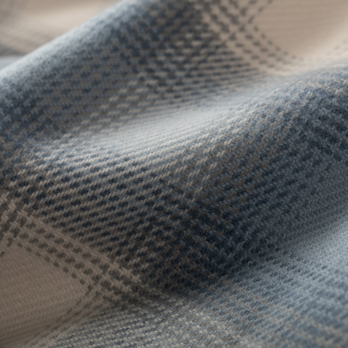 Close-up of the Men's Every Day Elite Flannel Shirt in Mendocino Blue, showcasing its soft, heavyweight Portuguese flannel fabric with blue and white plaid, gentle folds, and cozy texture.