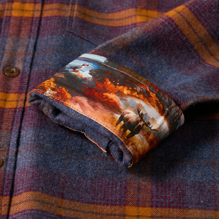 The Pladra Men's Every Day Flannel Shirt in Portsmouth Blue Heather has 100% cotton and cuff art of moose and trees.
