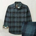 Men's Fireside Flannel in Fjord Green, a green plaid with brown buttons, two chest pockets, and deer-print collar and cuff lining.