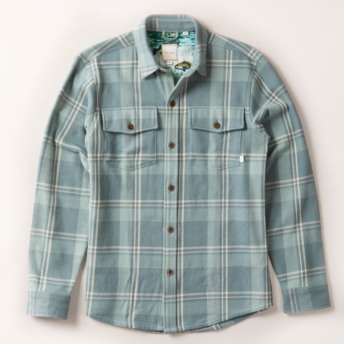 Pladra Men's Fireside Flannel in Island Blue with button front, two chest pockets, and long sleeves on white background.