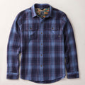 Men's Fireside Flannel in Riffle Blue by Pladra, shown laid flat with chest pockets on a white background.